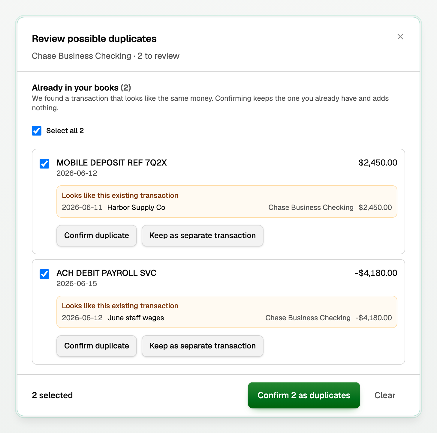 Two bank transactions under Already in your books, each beside the imported transaction it matches, with Confirm 2 as duplicates