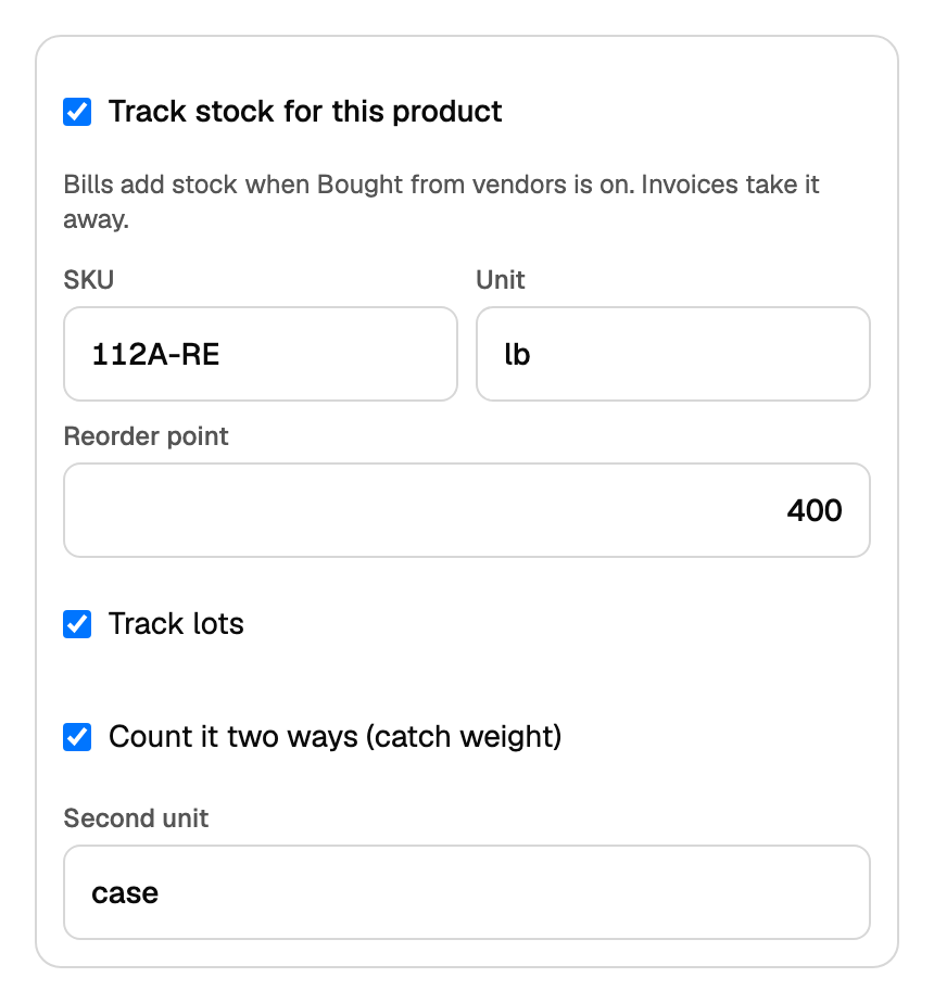 The Edit item stock box with Track stock ticked, SKU, Unit, Reorder point, Track lots, and catch weight